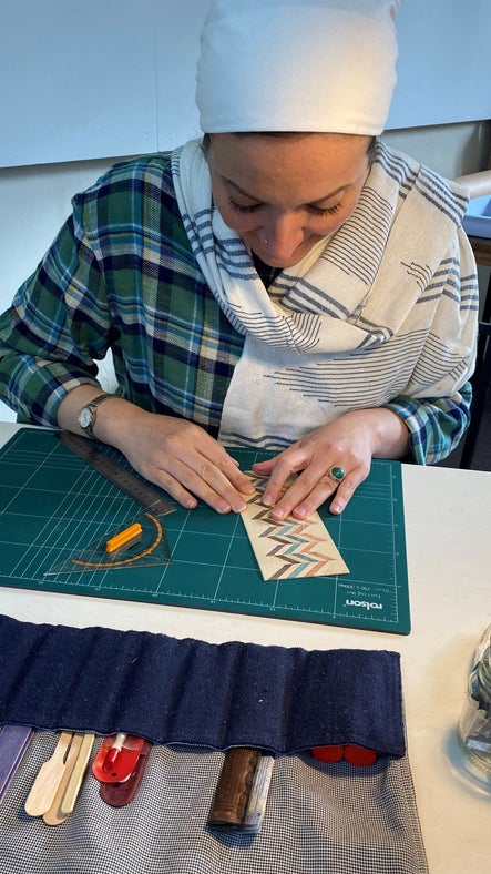 Nesreen Sharara Artist in residence at Blickling Estate at work crafting wooden boxes